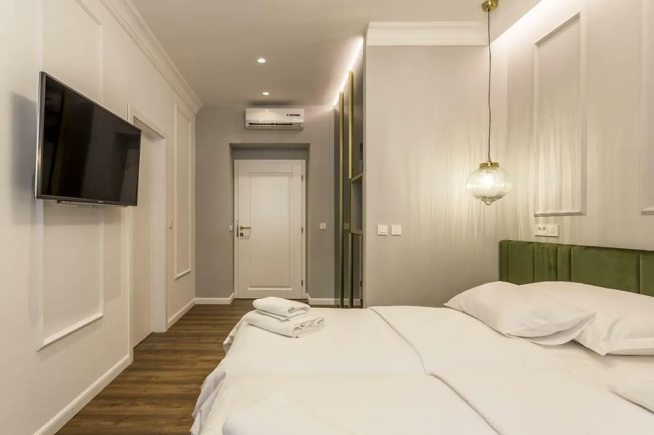 Nephelae Boutique Rooms kontakter